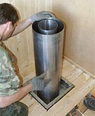 Проход трубы через потолок бани Проход трубы через потолок бани